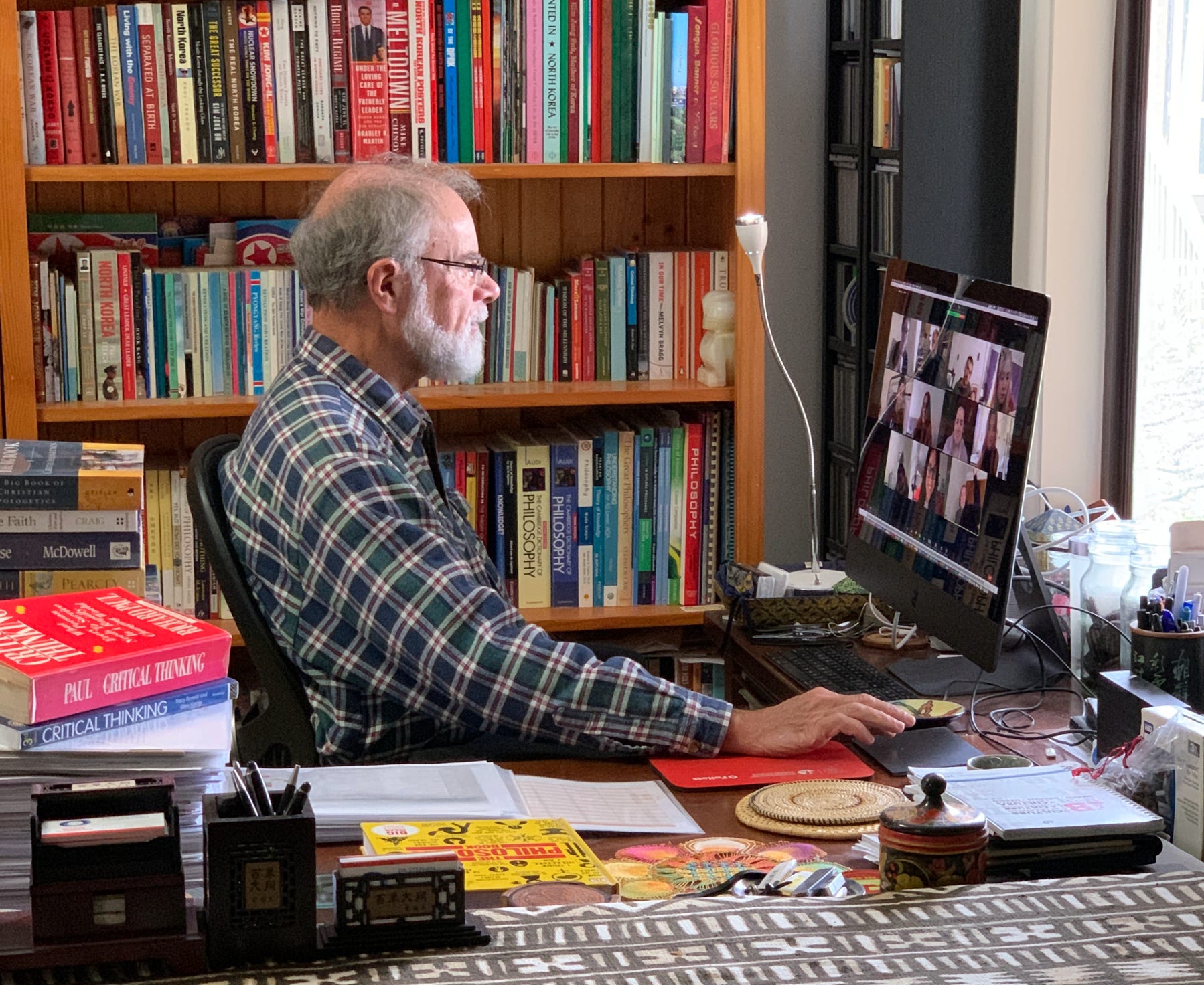 Stephen Codrington teaching a Critical Thinking course online via Zoom from his home office in 2020.