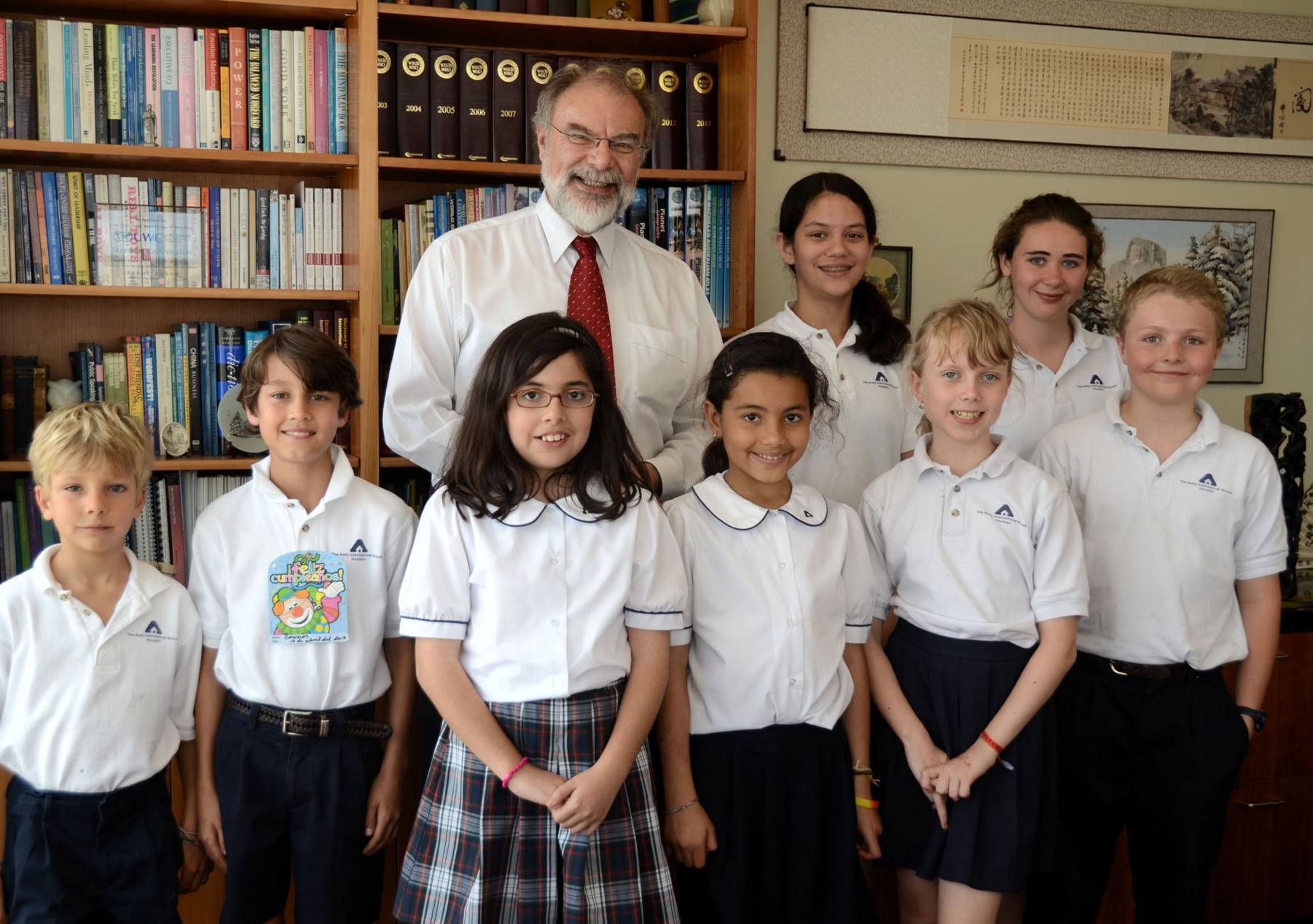 Stephen Codrington stands beside the efficgy of Nelson Mandela at Madama Tussauds in London